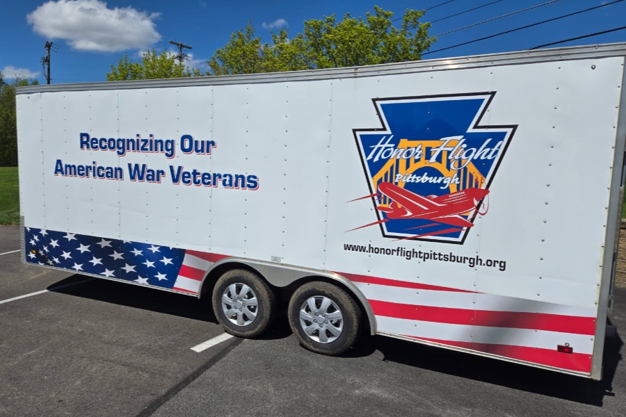 Trailer with Honor FLight Pittsburgh Logo and the words 'Recognizing Our American War Veterans'